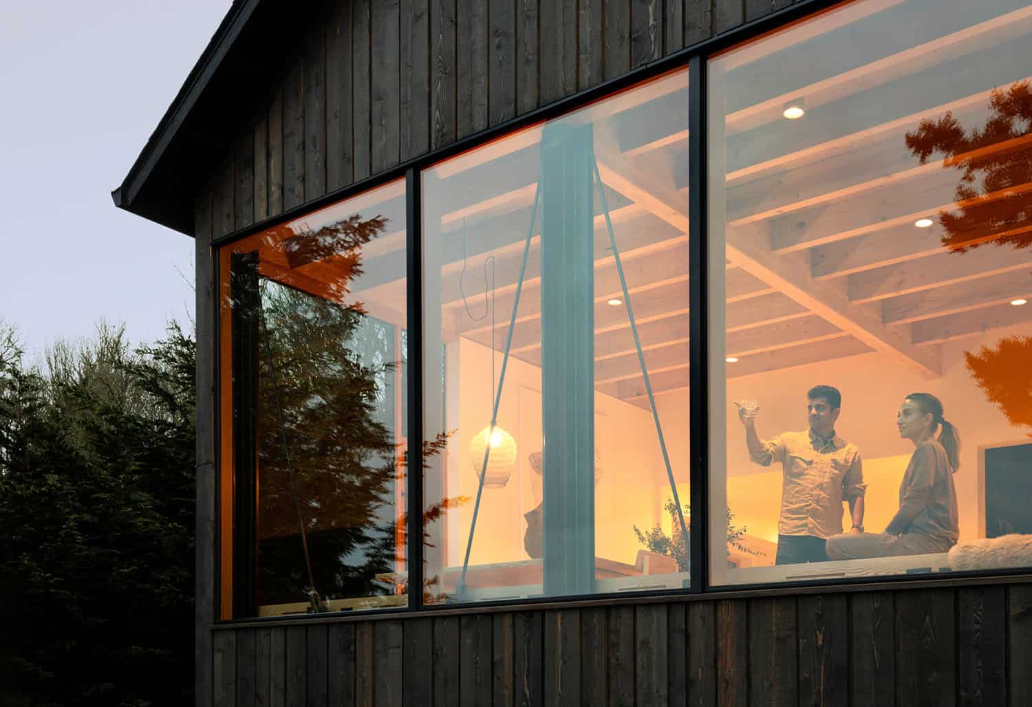 modern-cabin-exterior-at-dusk