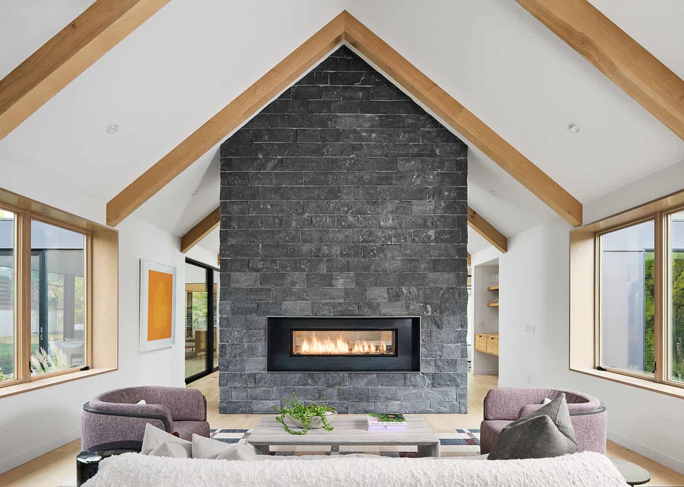 modern-liviing-room-with-a-dual-sided-fireplace