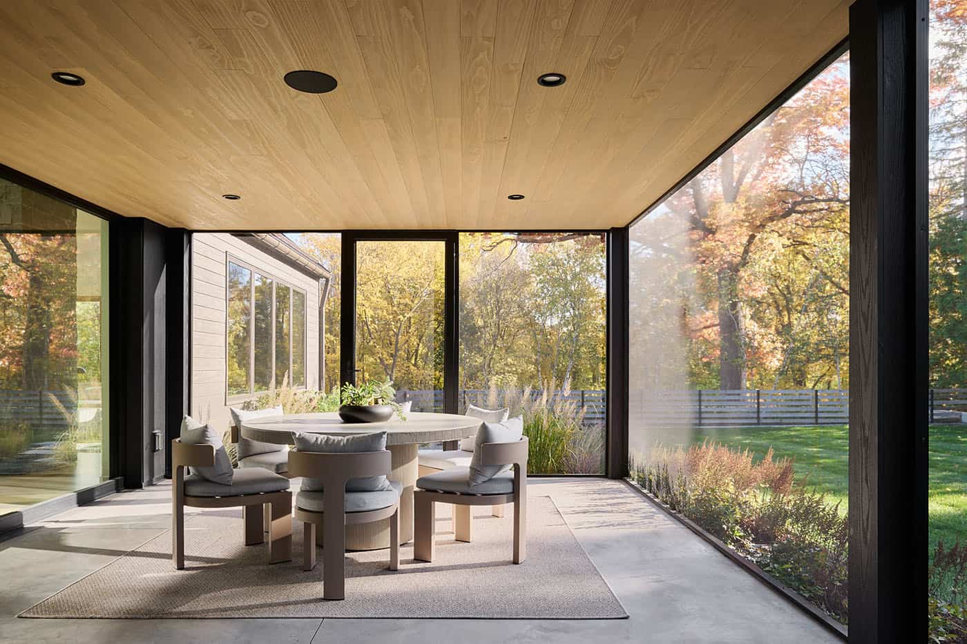 modern-screened-porch-with-outdoor-dining