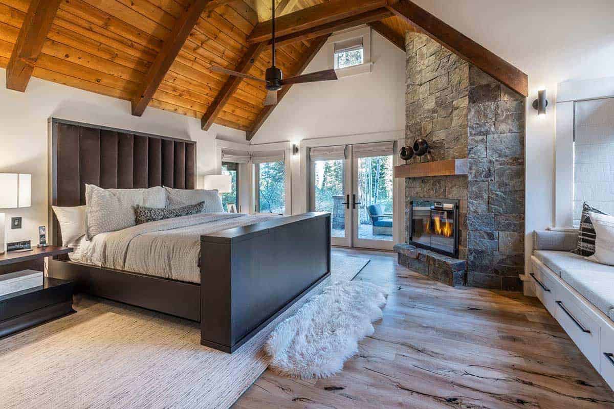 modern-mountain-style-bedroom-with-a-fireplace