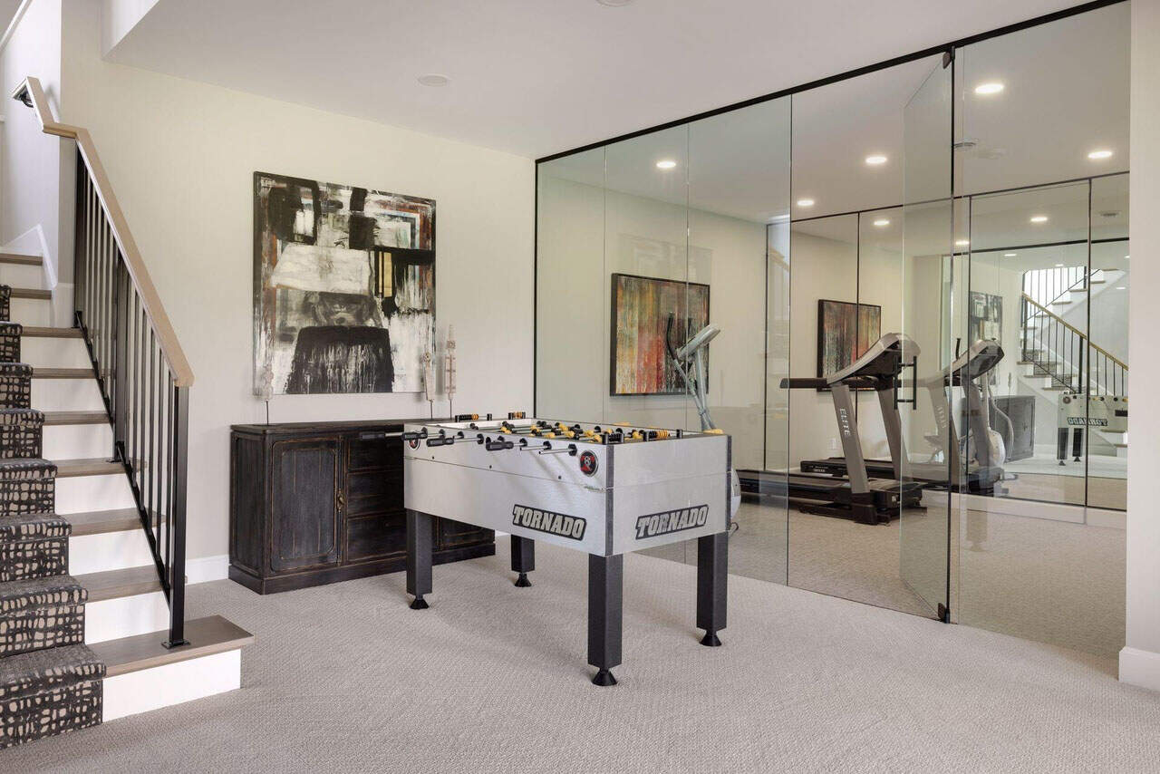 modern-lower-level-game-room-and-home-gym