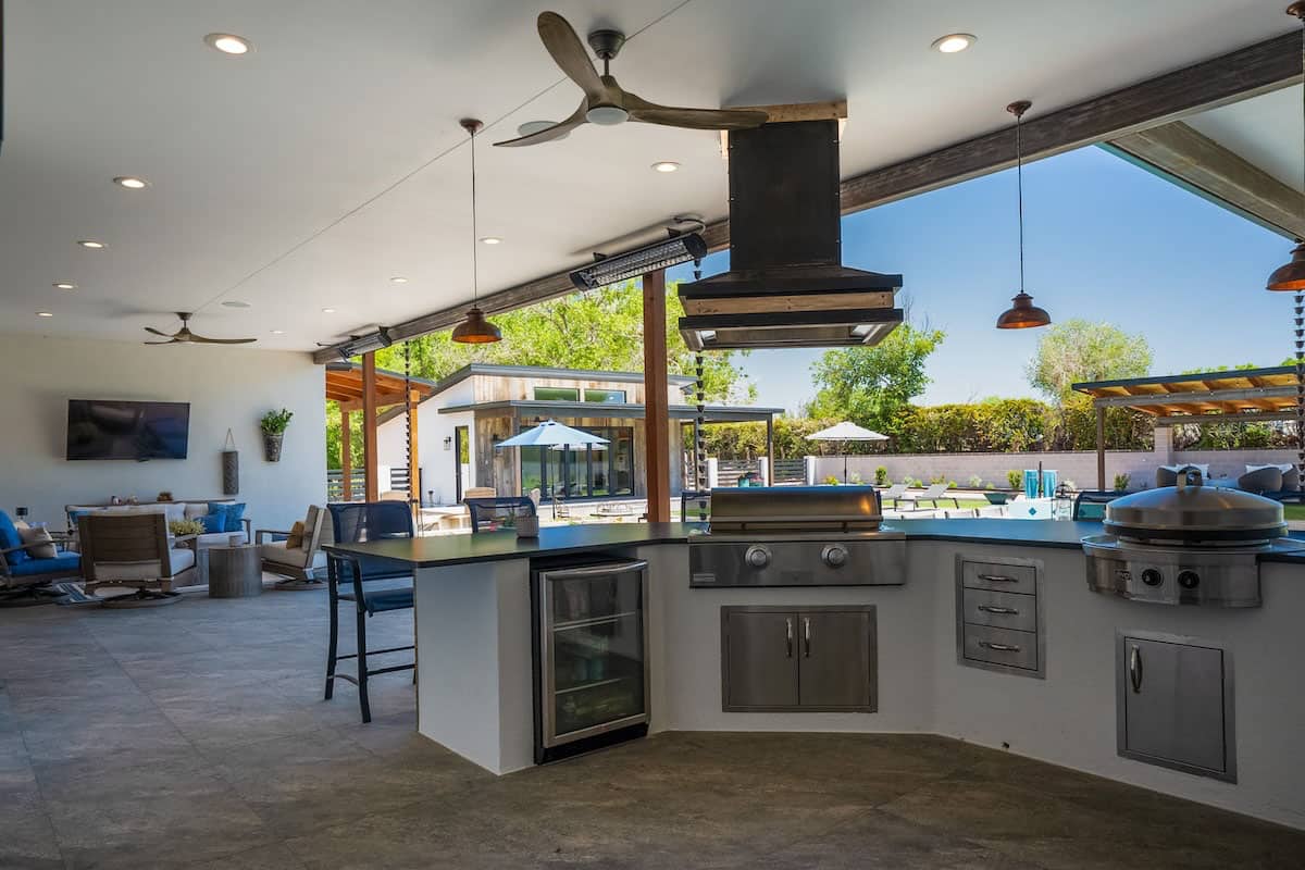 ranch-house-exterior-with-an-outdoor-kitchen