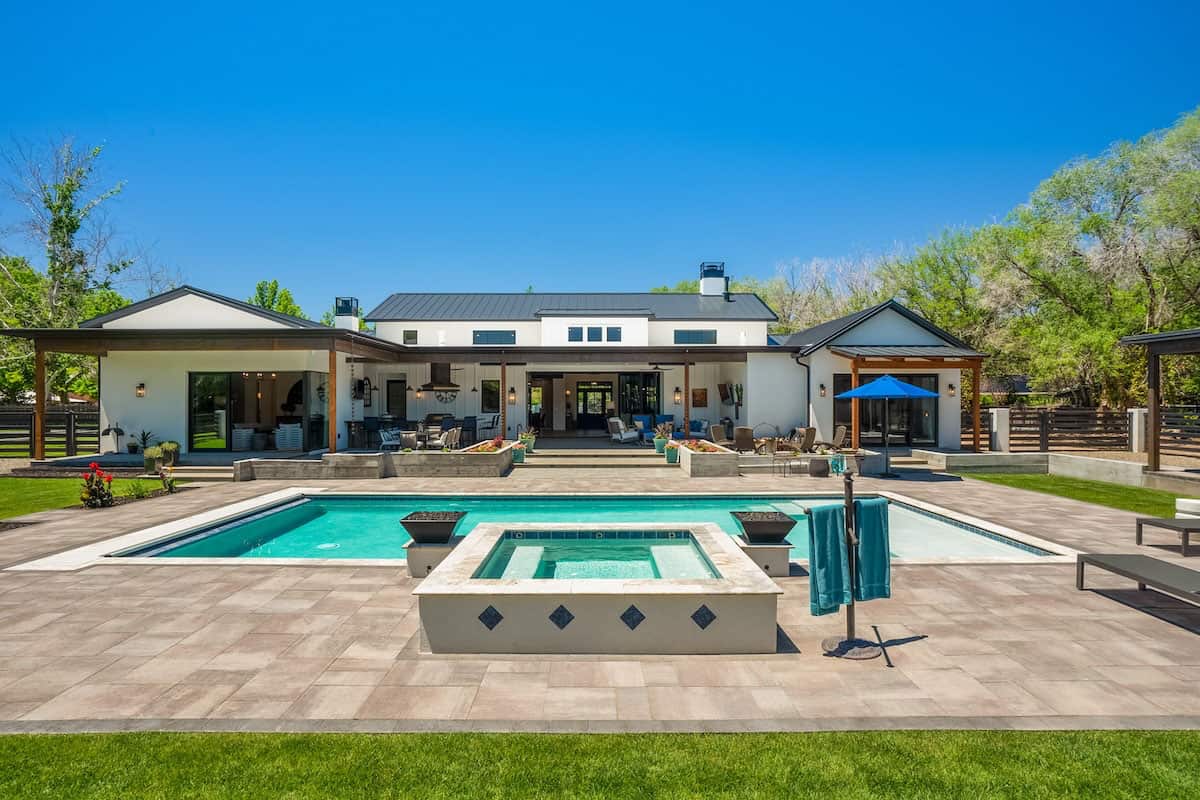 ranch-house-backyard-with-a-pool-and-hot-tub