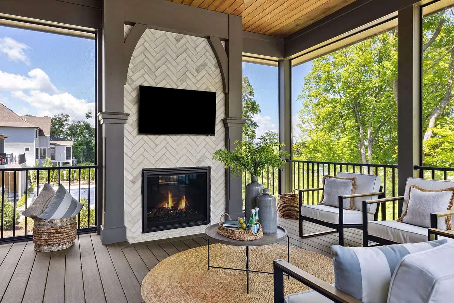 old-world-style-screened-porch-with-a-fireplace