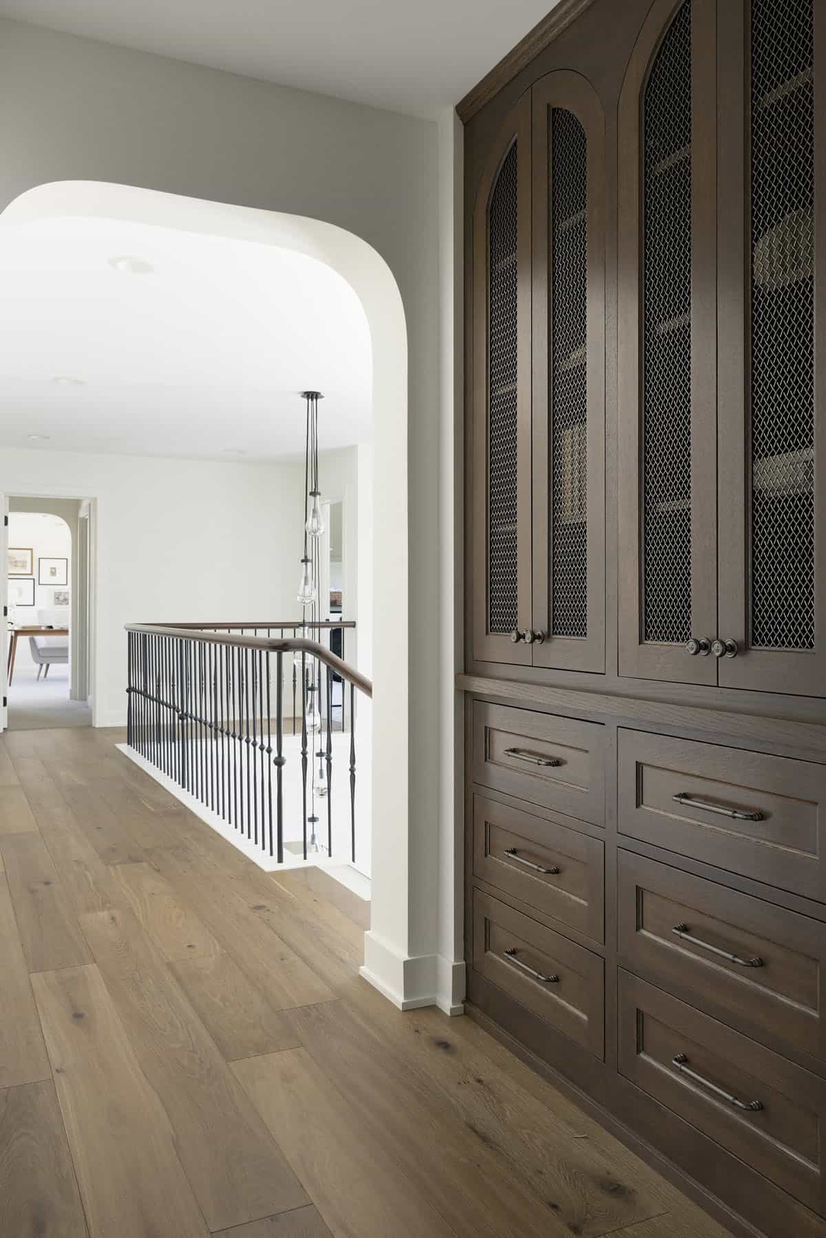 contemporary-staircase-upstairs-hallway-with-a-built-in