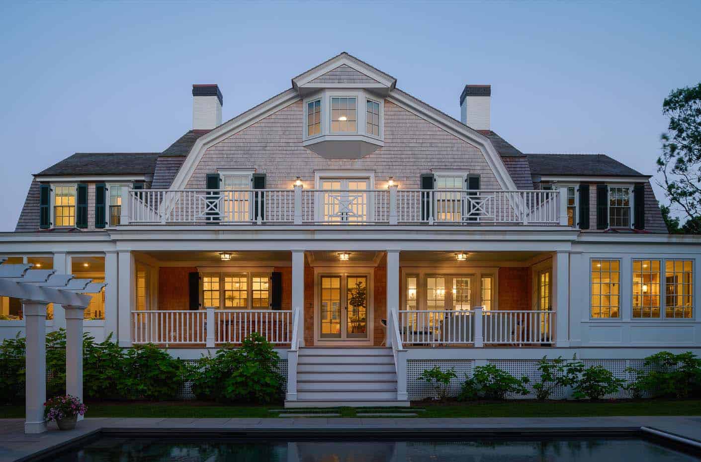 shingle-style-beach-house-exterior-at-dusk