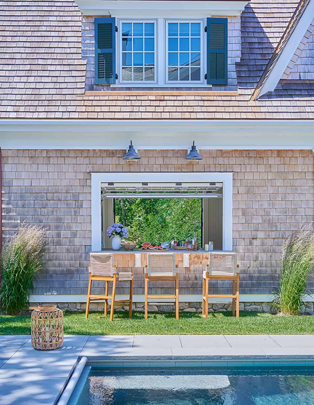 shingle-style-beach-house-exterior-with-a-pass-through-window-and-bar