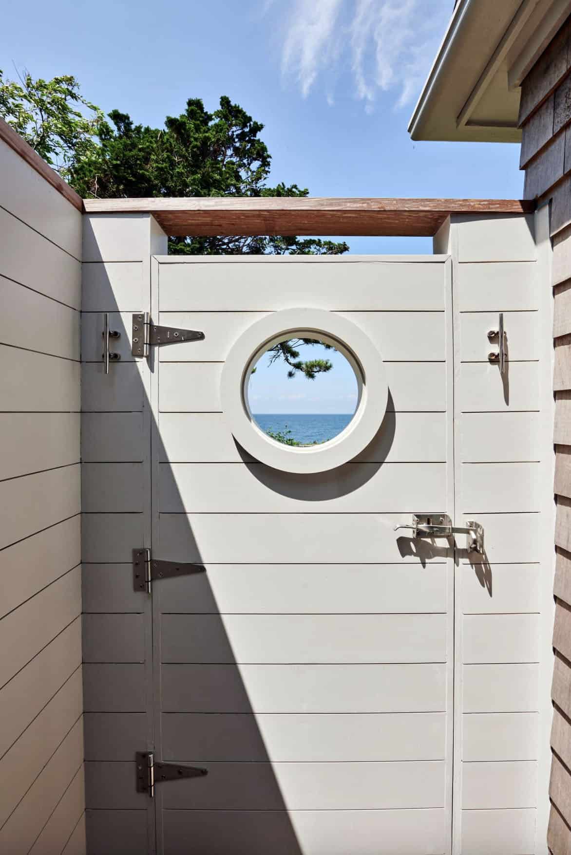 beach-style-outdoor-shower-with-a-porthole