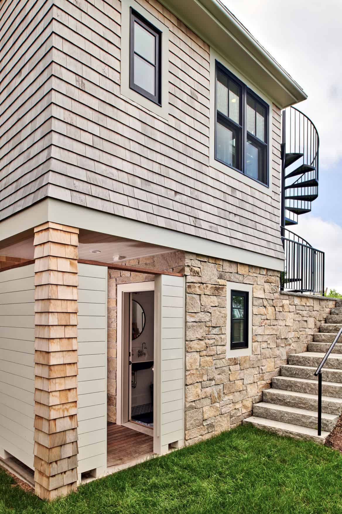 shingle-style-waterfront-house-exterior-with-a-staircase