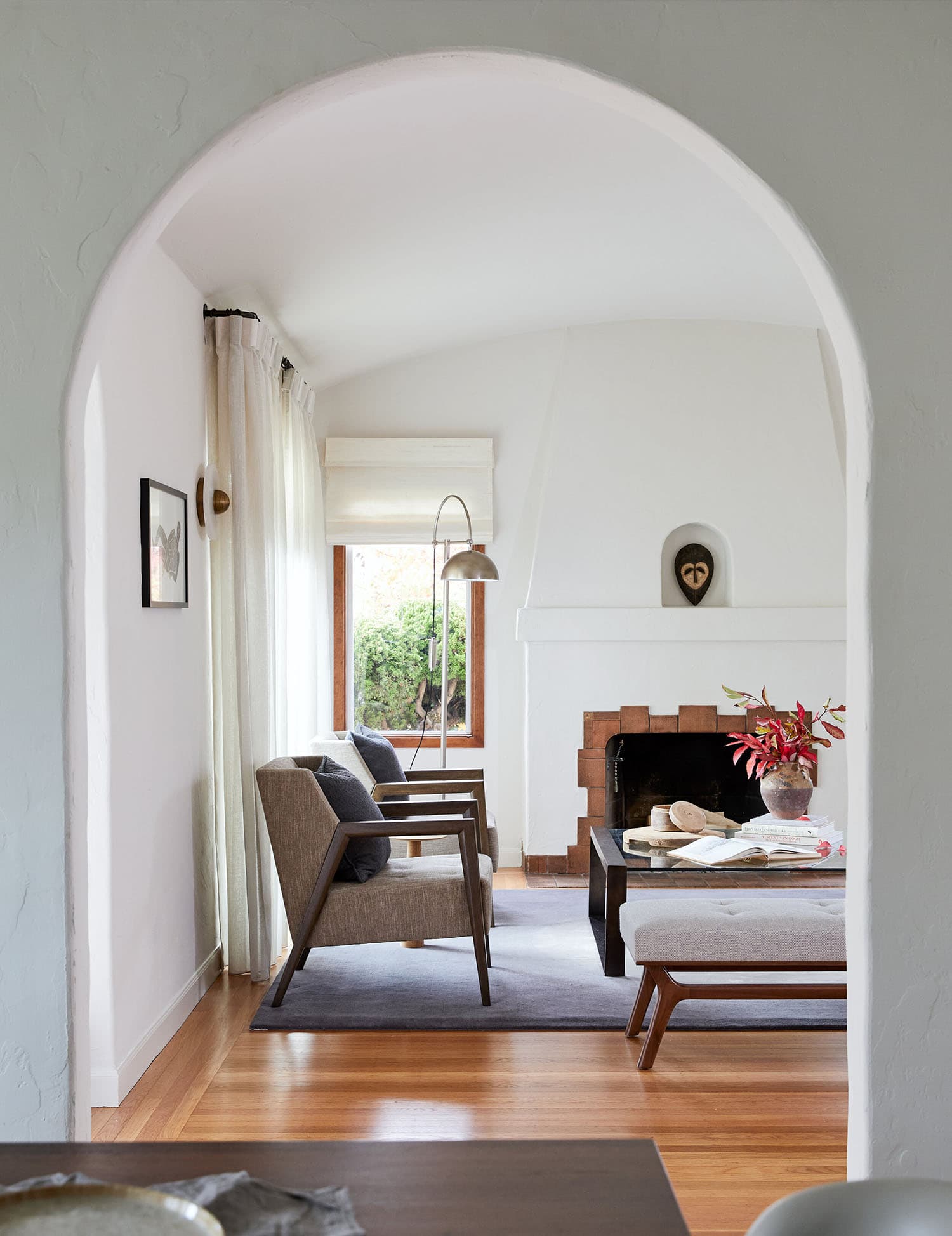 spanish-mediterranean-style-living-room-with-a-fireplace