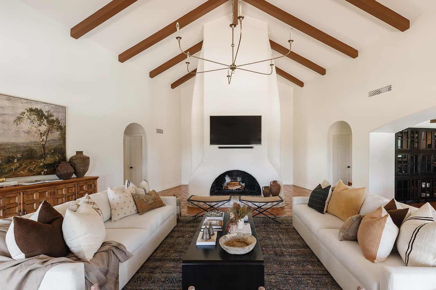 Spanish-revival-living-room-with-a-fireplace