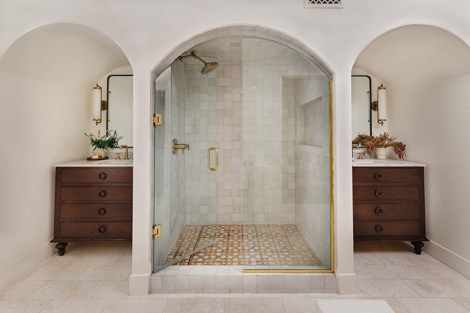 Spanish-revival-bathroom-with-a-large-shower-and-dual-vanities