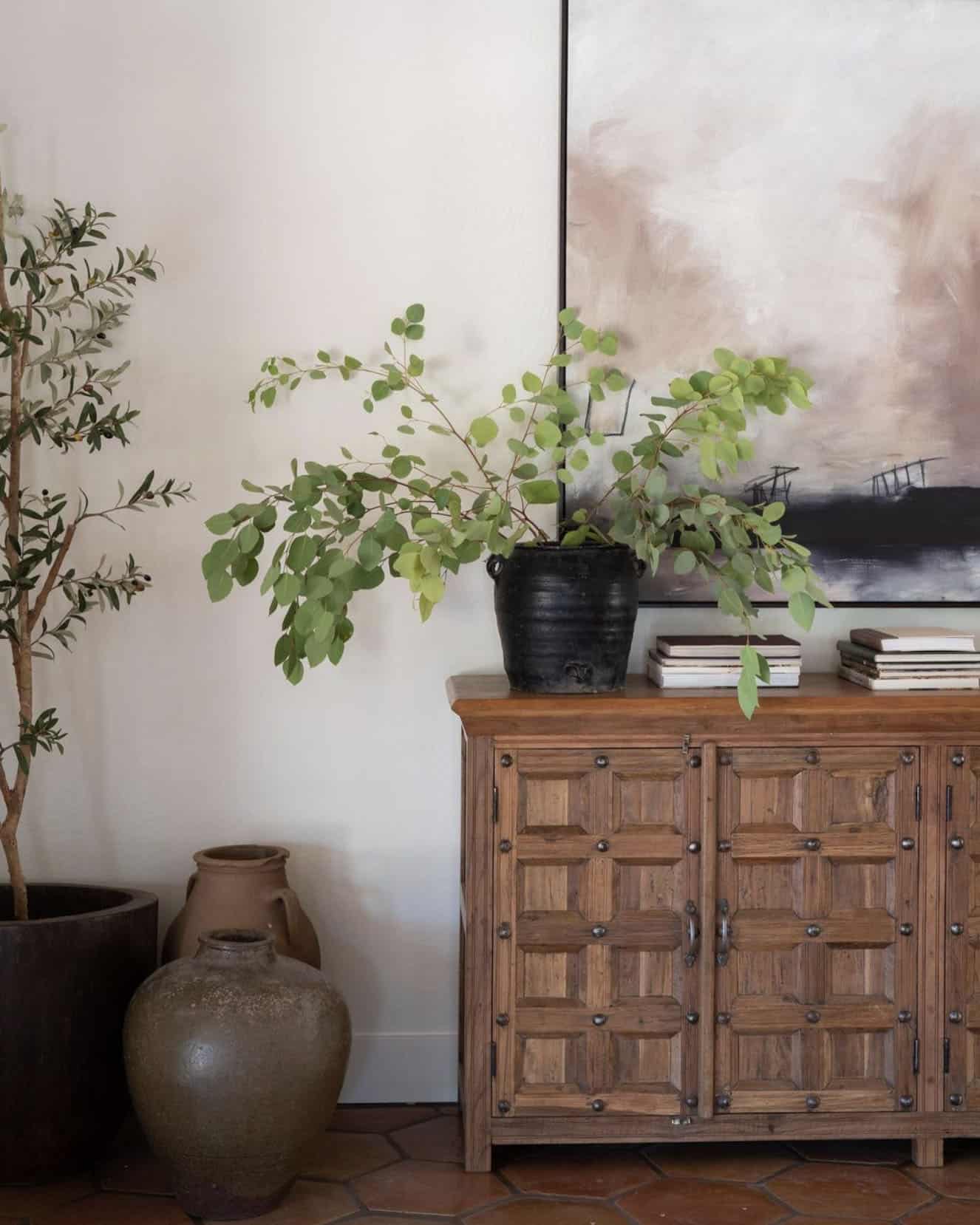 console-table-with-vases-and-artwork