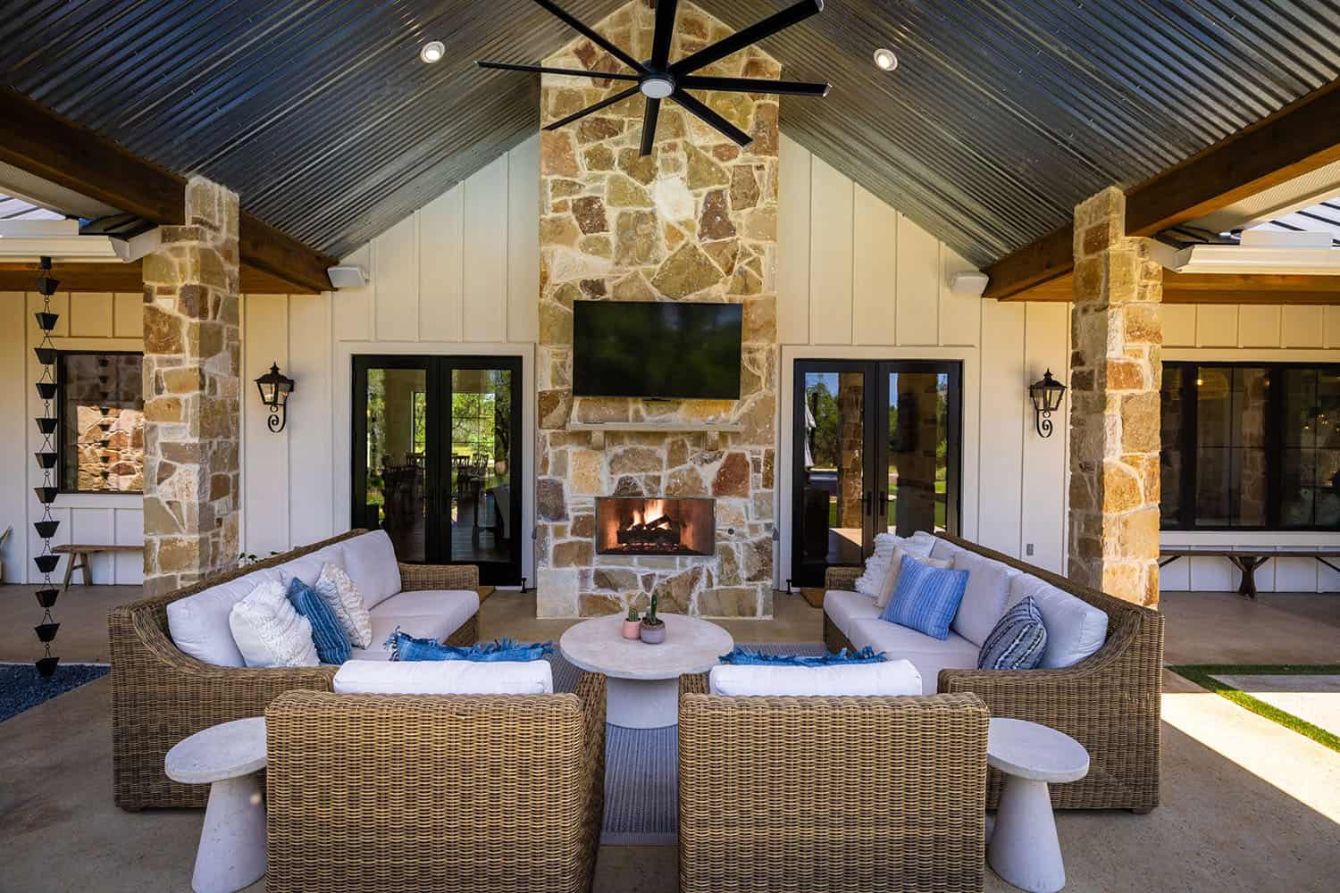 Texas-hill-country-style-home-covered-patio-with-a-fireplace