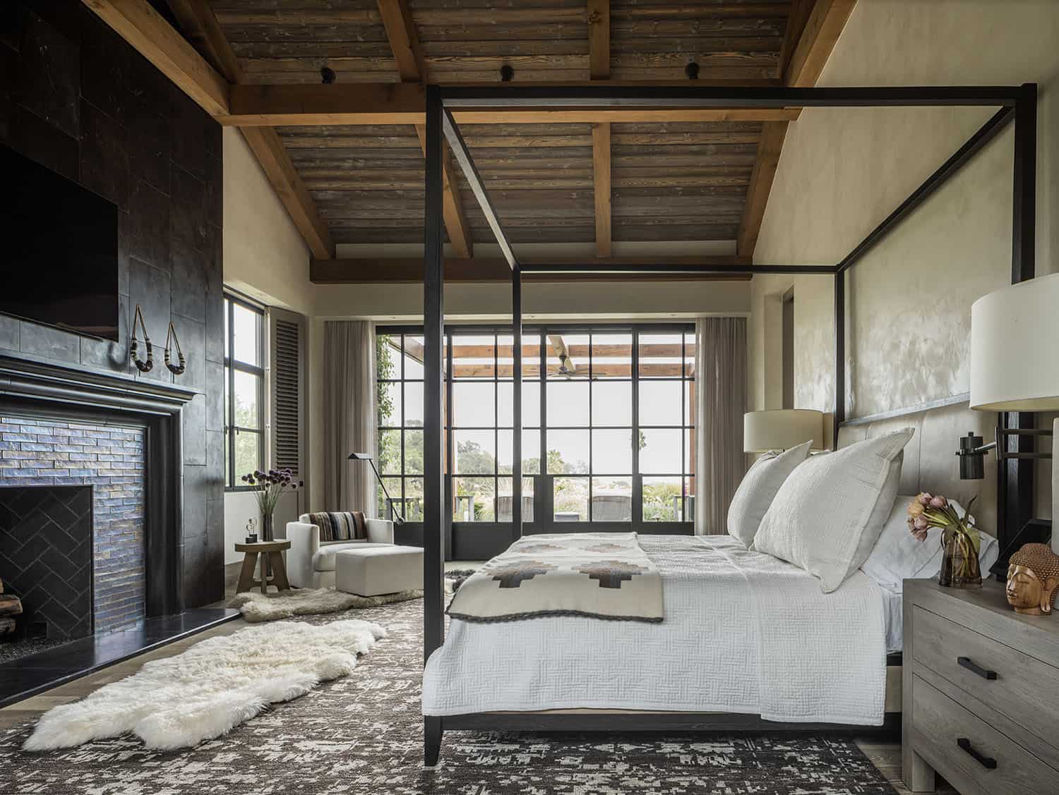 farmhouse-bedroom-with-a-fireplace