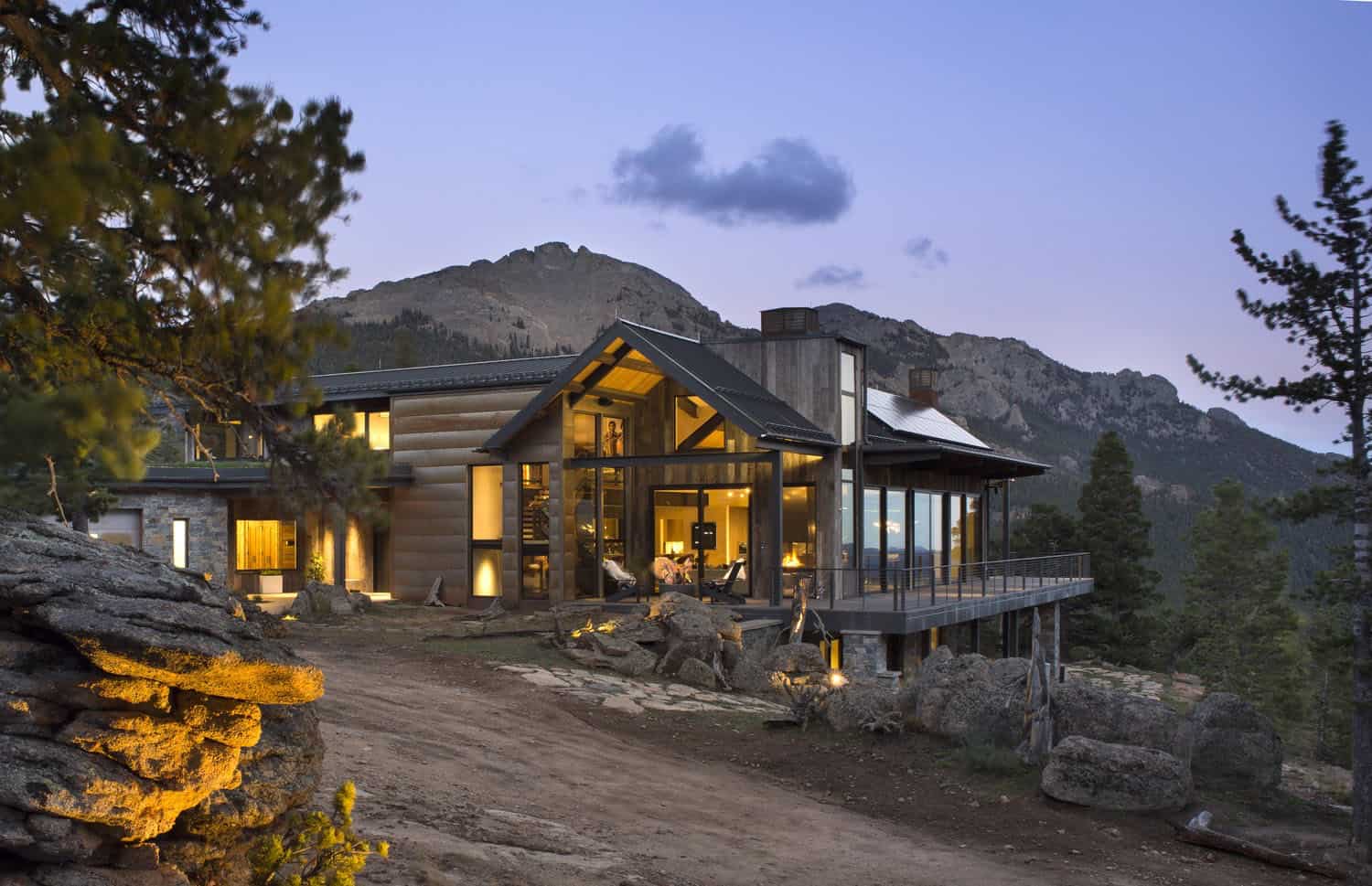 contemporary mountain home exterior at dusk