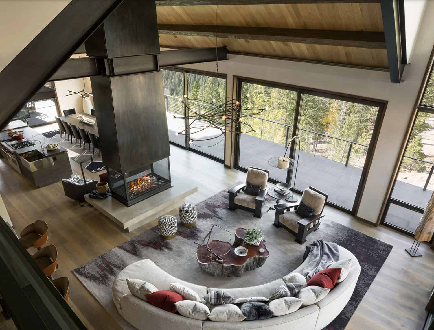 contemporary living room with a dual-sided fireplace overhead view