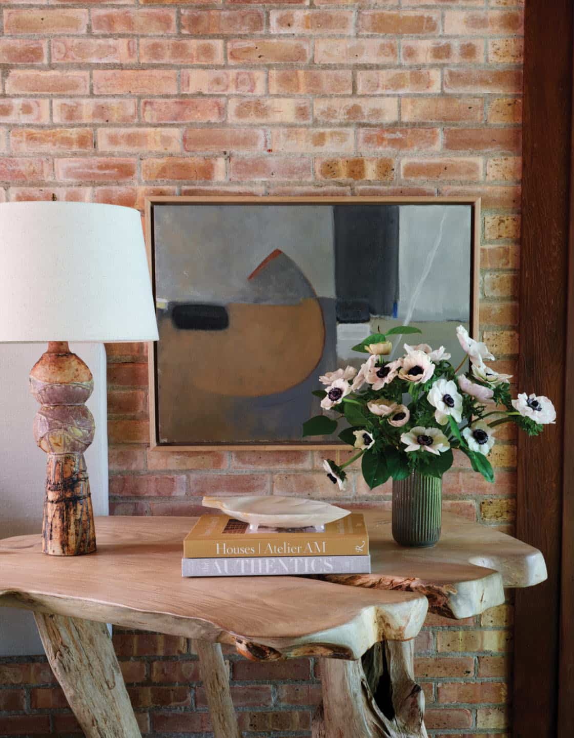 midcentury modern bedroom with a brick wall