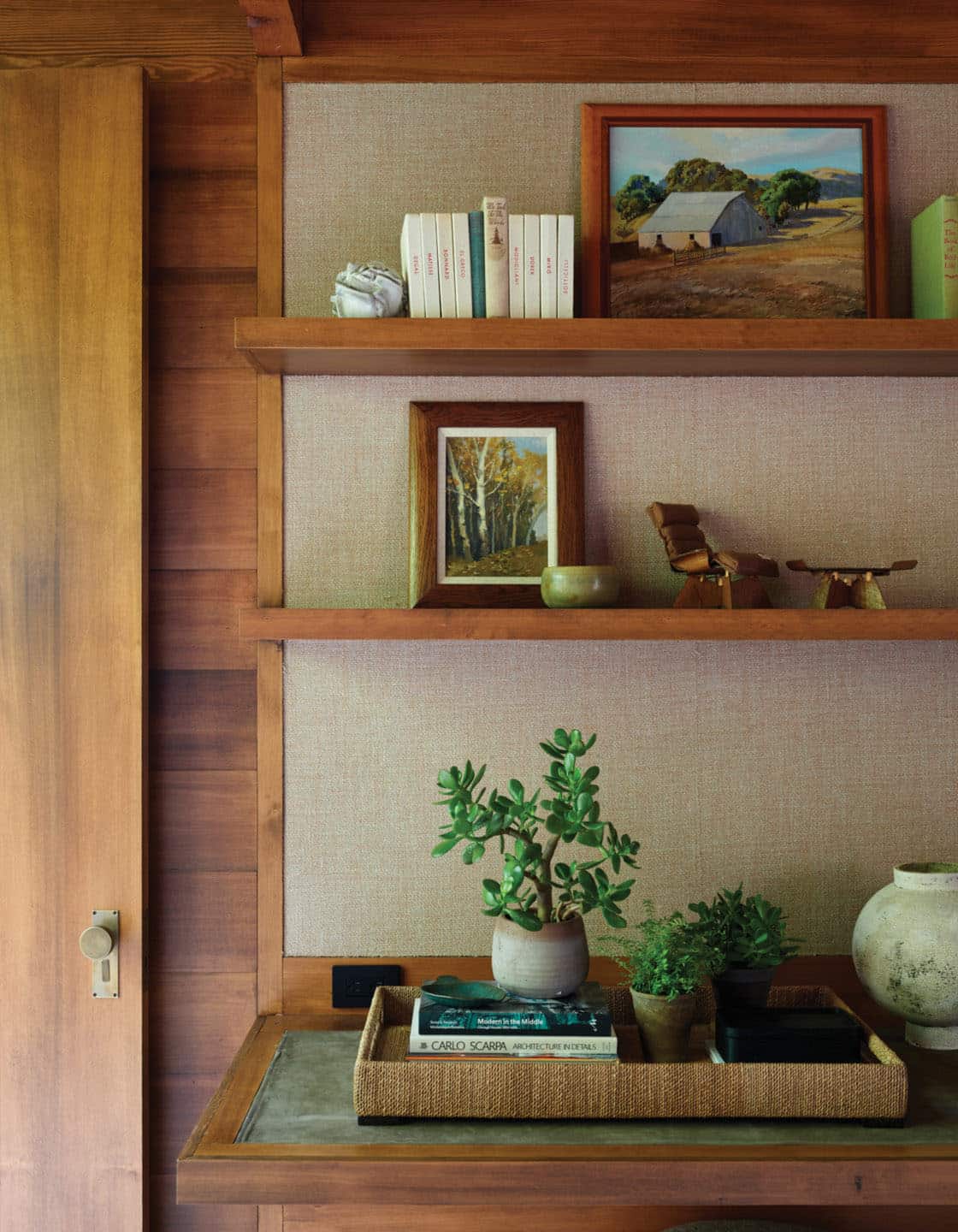 midcentury modern home office with open display shelves