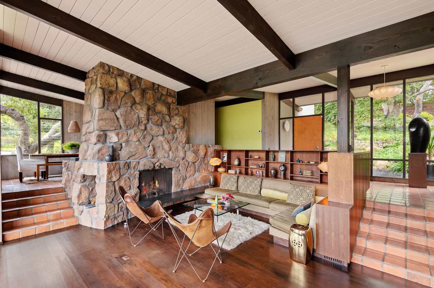 mid-century modern living room with a fireplace