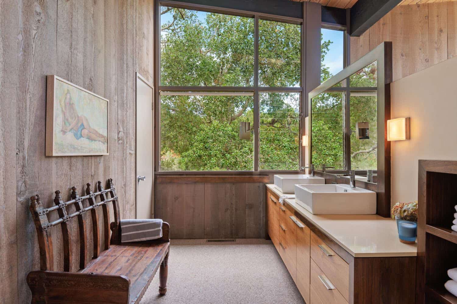 mid-century modern bathroom vanity with dual sinks and large windows