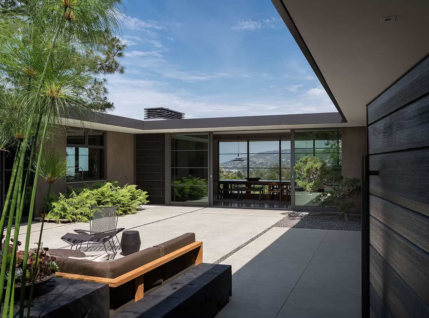 midcentury modern house exterior with a courtyard