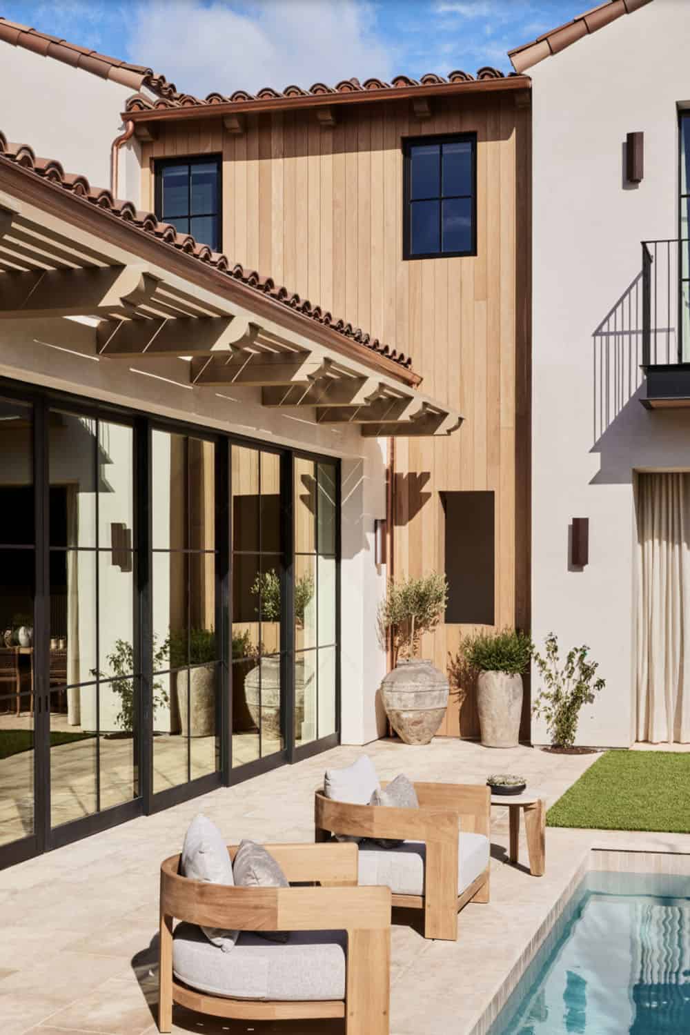 modern-spanish-style-home-exterior-with-a-pool