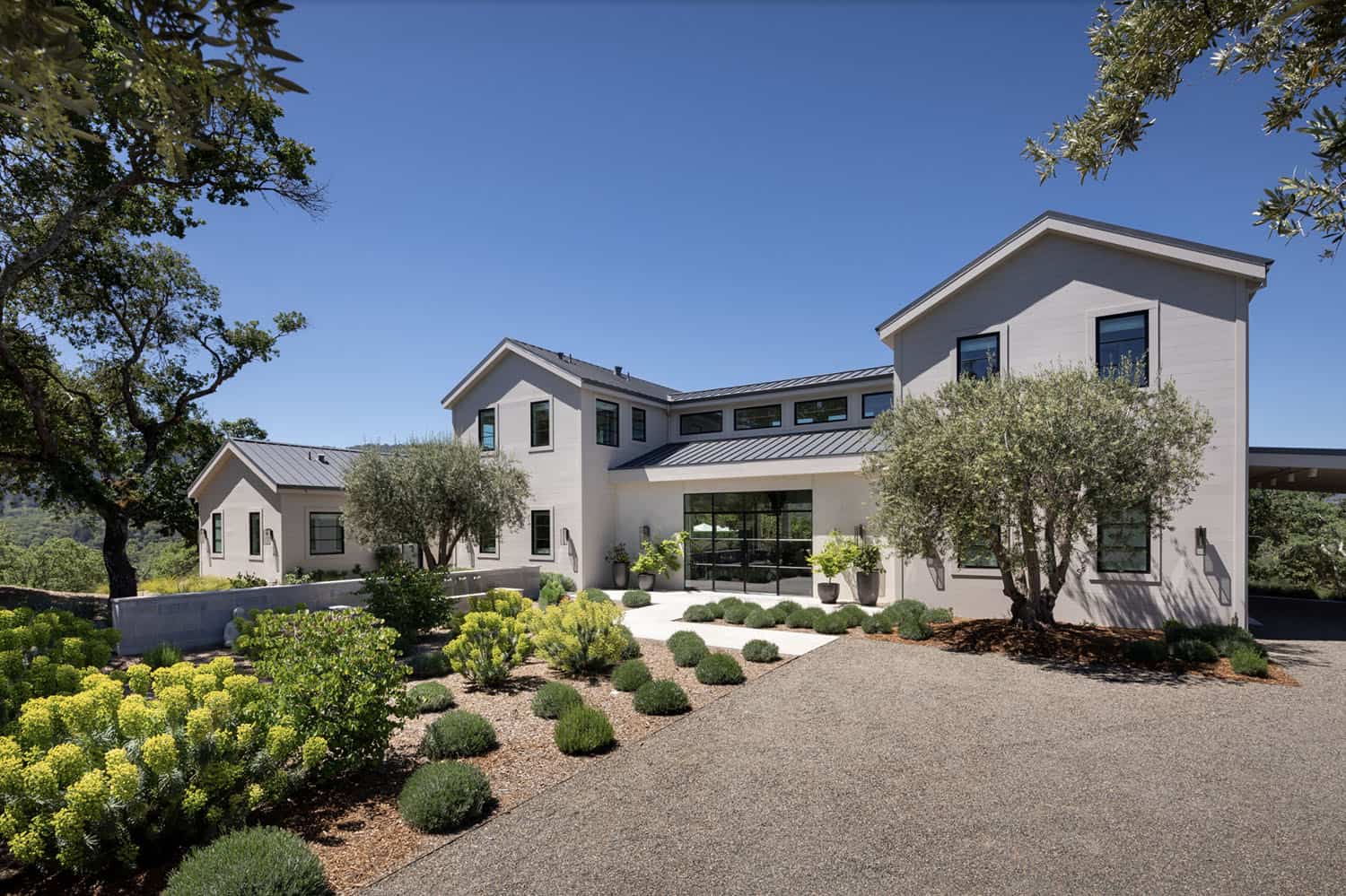 farmhouse style home exterior with landscaping