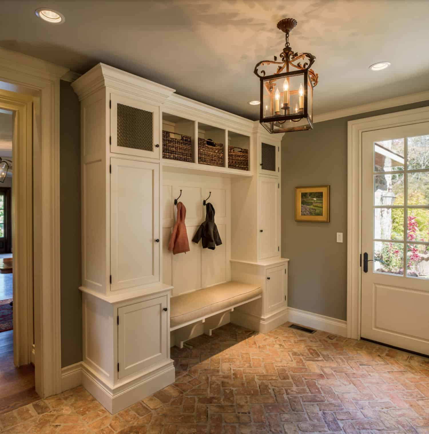 traditional mudroom entry with a built-in bench