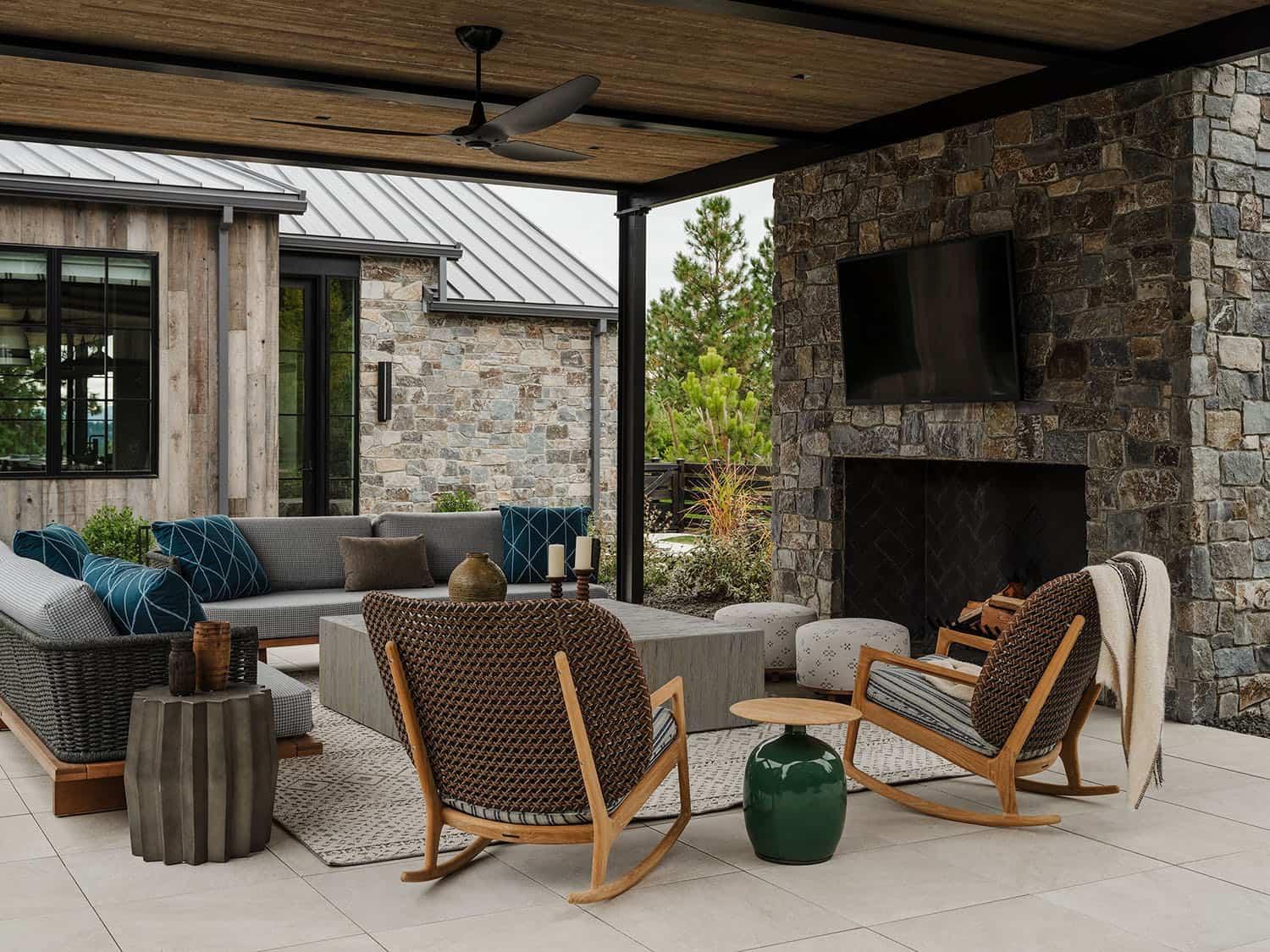 rustic modern home with a covered patio with outdoor furniture