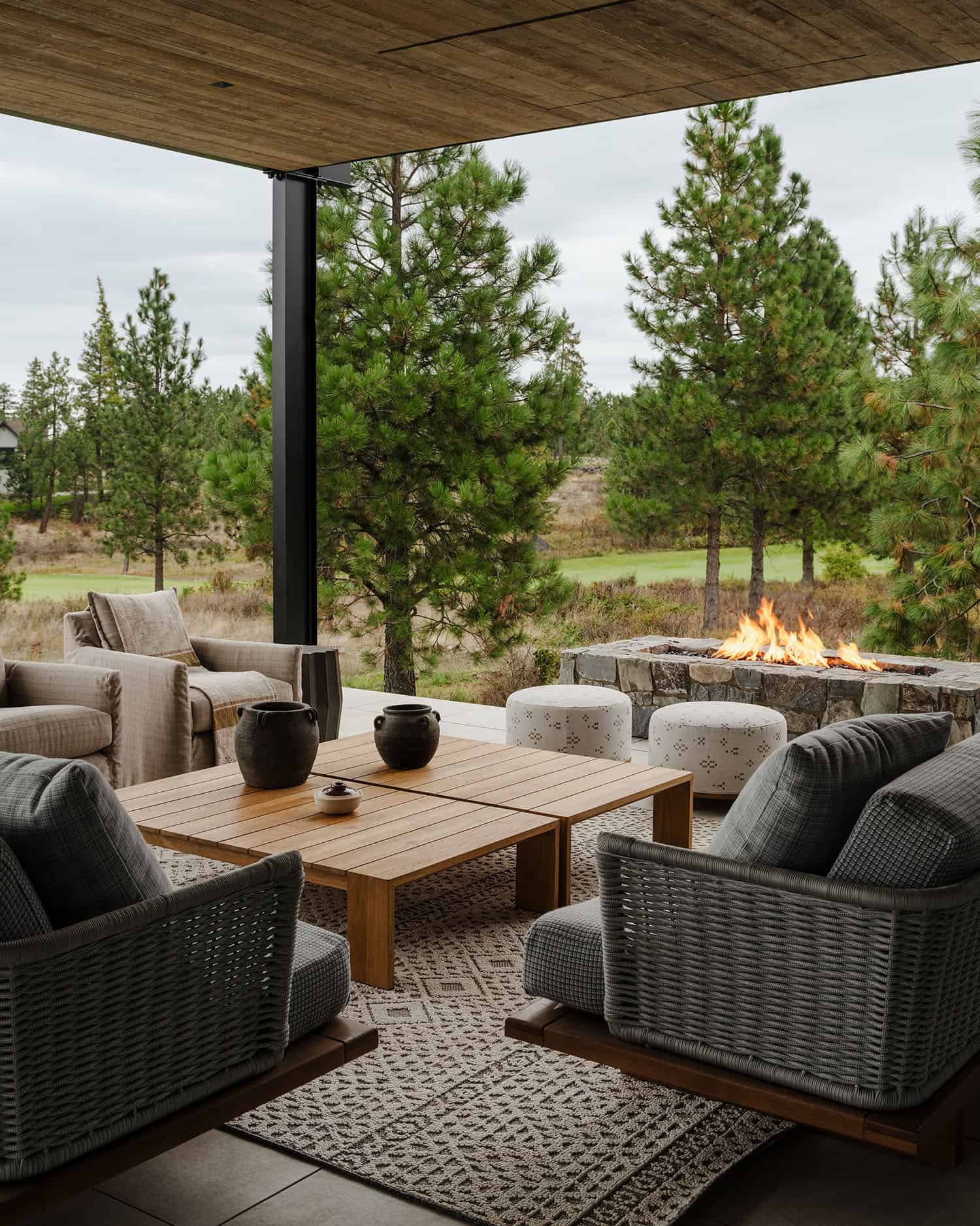 rustic modern home with a covered patio with outdoor furniture