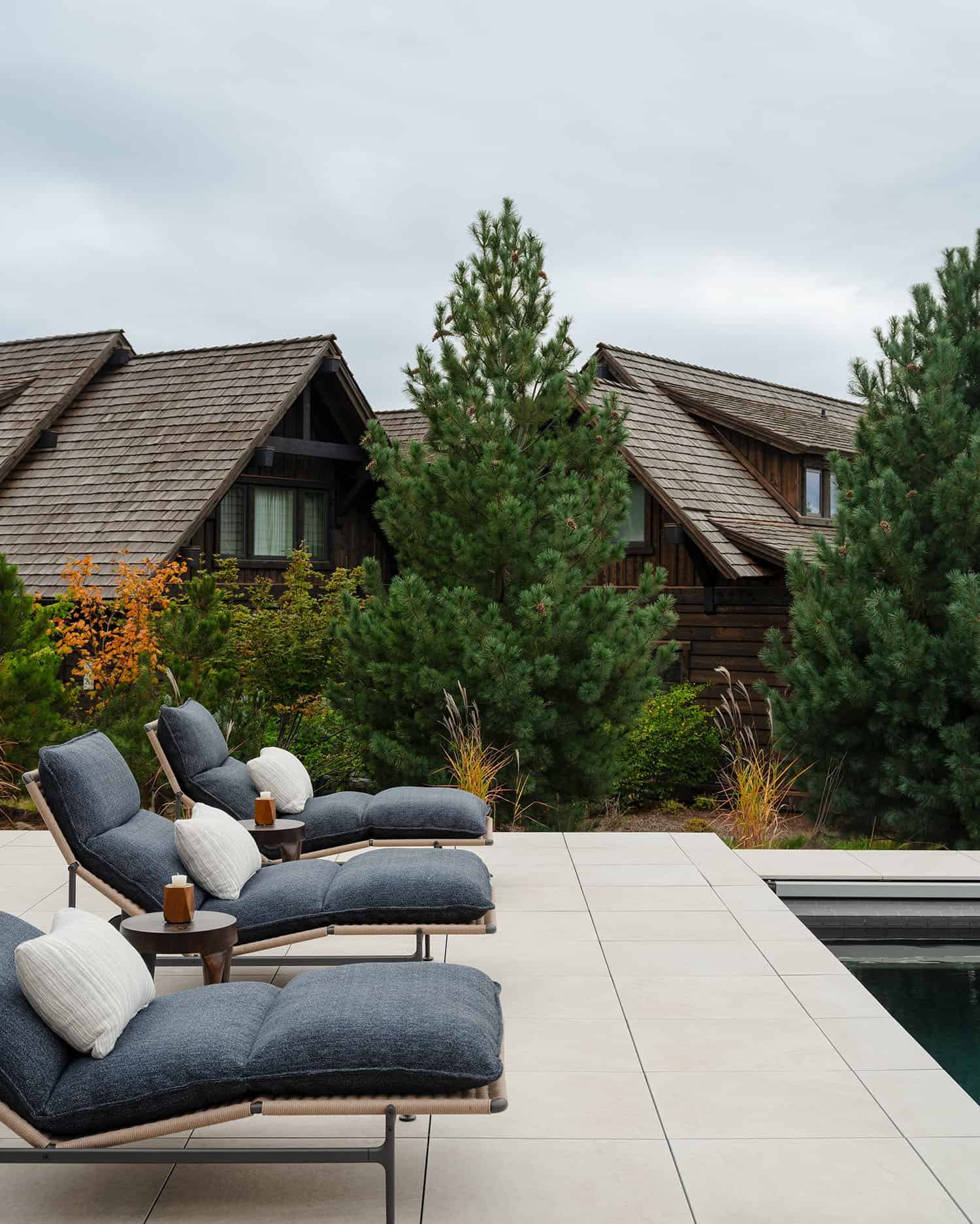 rustic modern home exterior with a pool