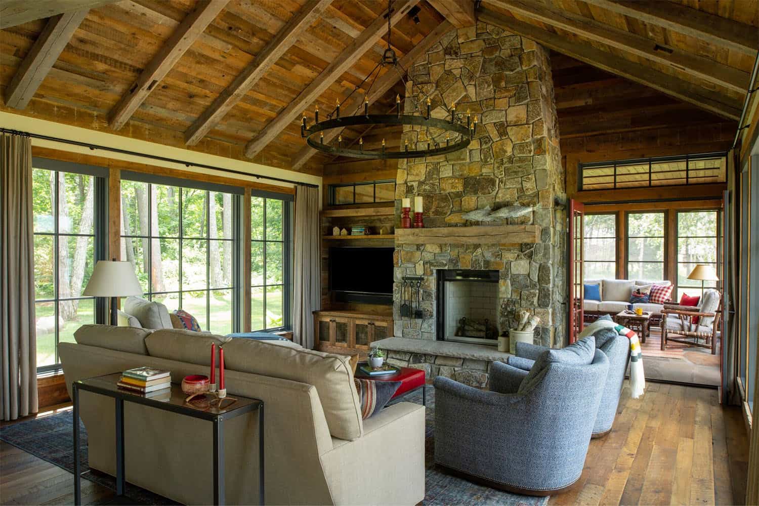 rustic modern living room with a stone fireplace