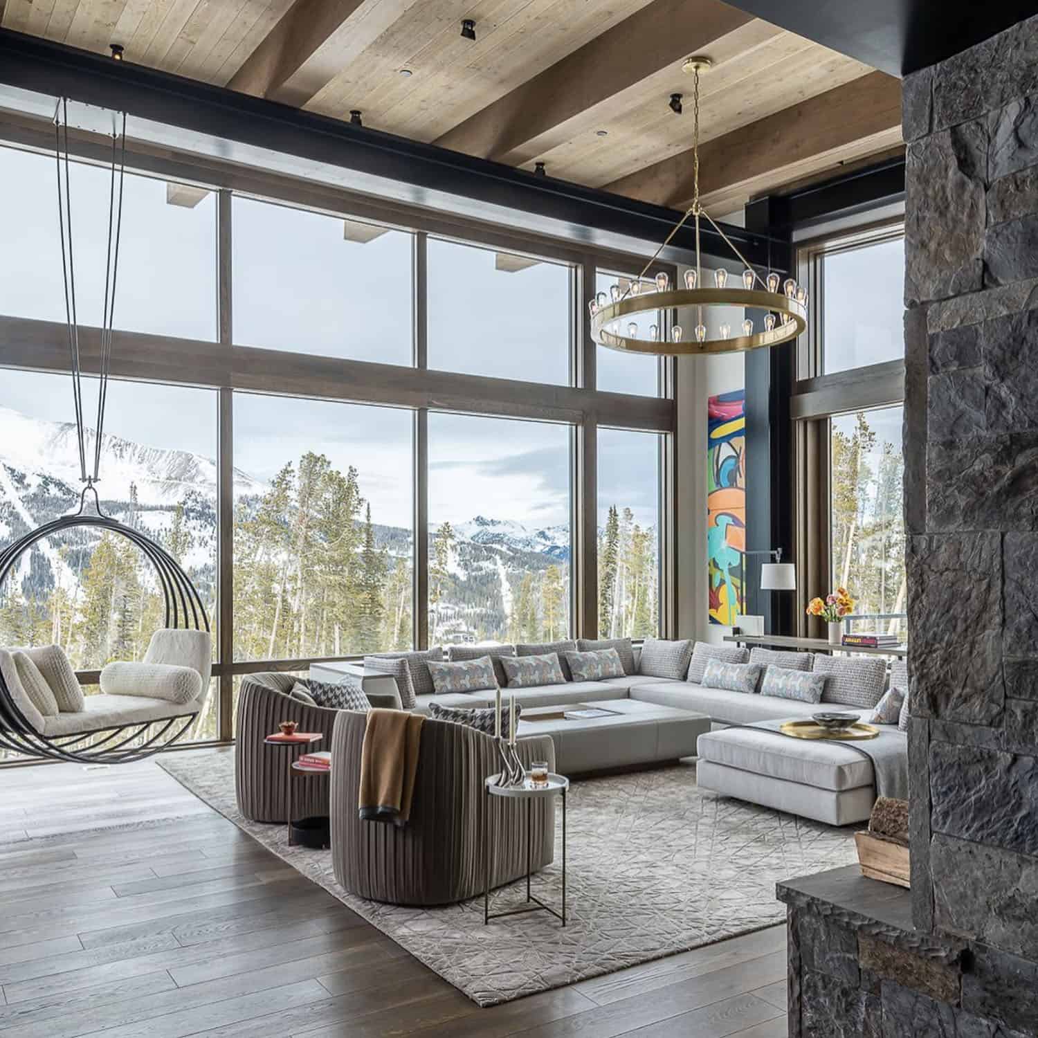 modern rustic living room with floor-to-ceiling glass