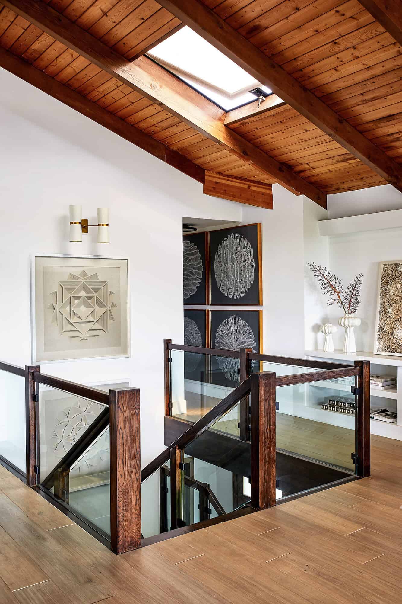 bohohemian style bungalow entry with a skylight