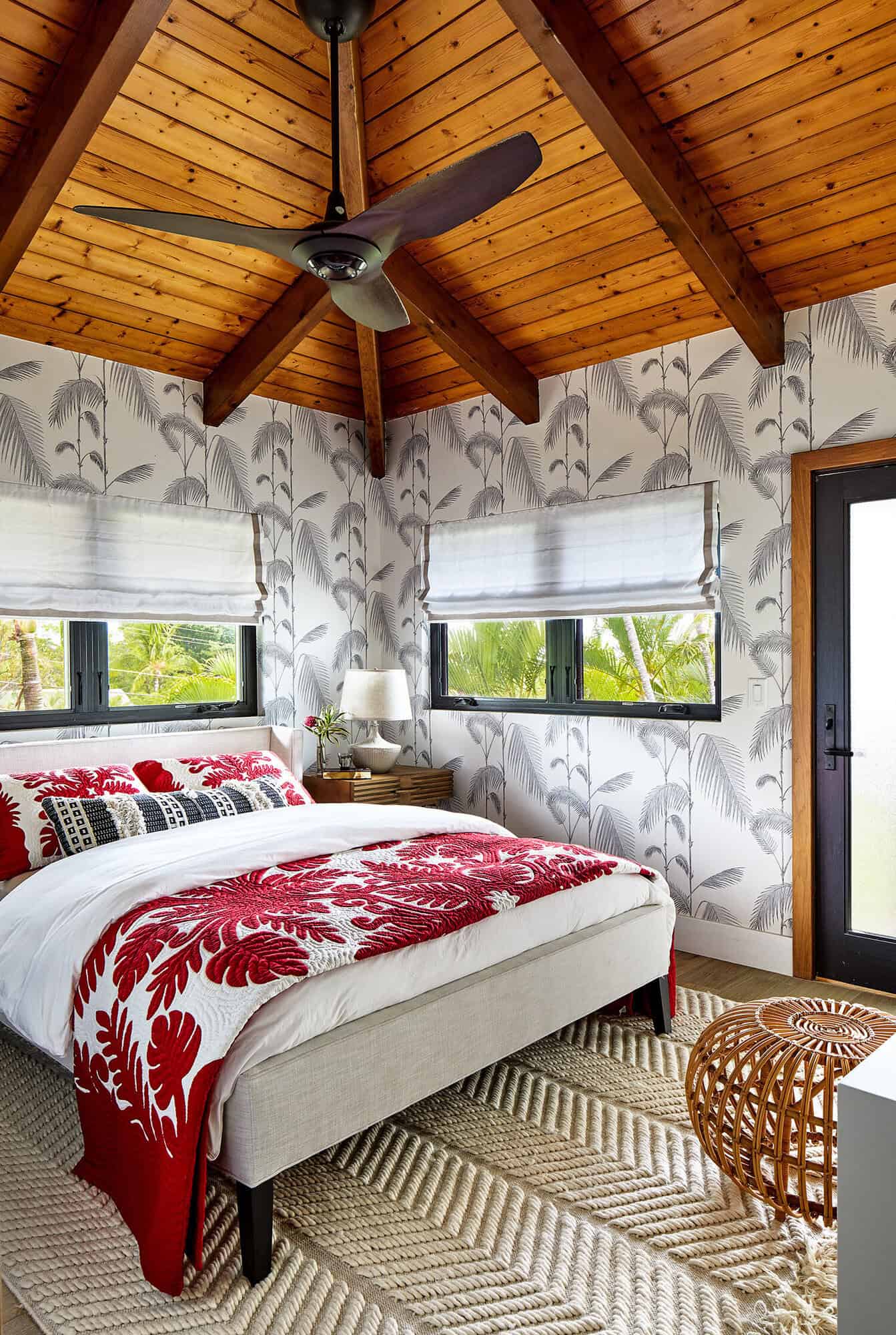 tropical bedroom with a leafy wallpaper