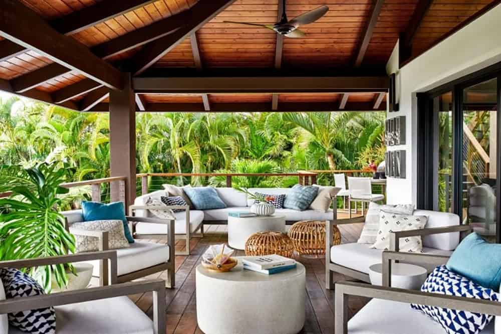 spacious covered patio with outdoor furniture for entertaining