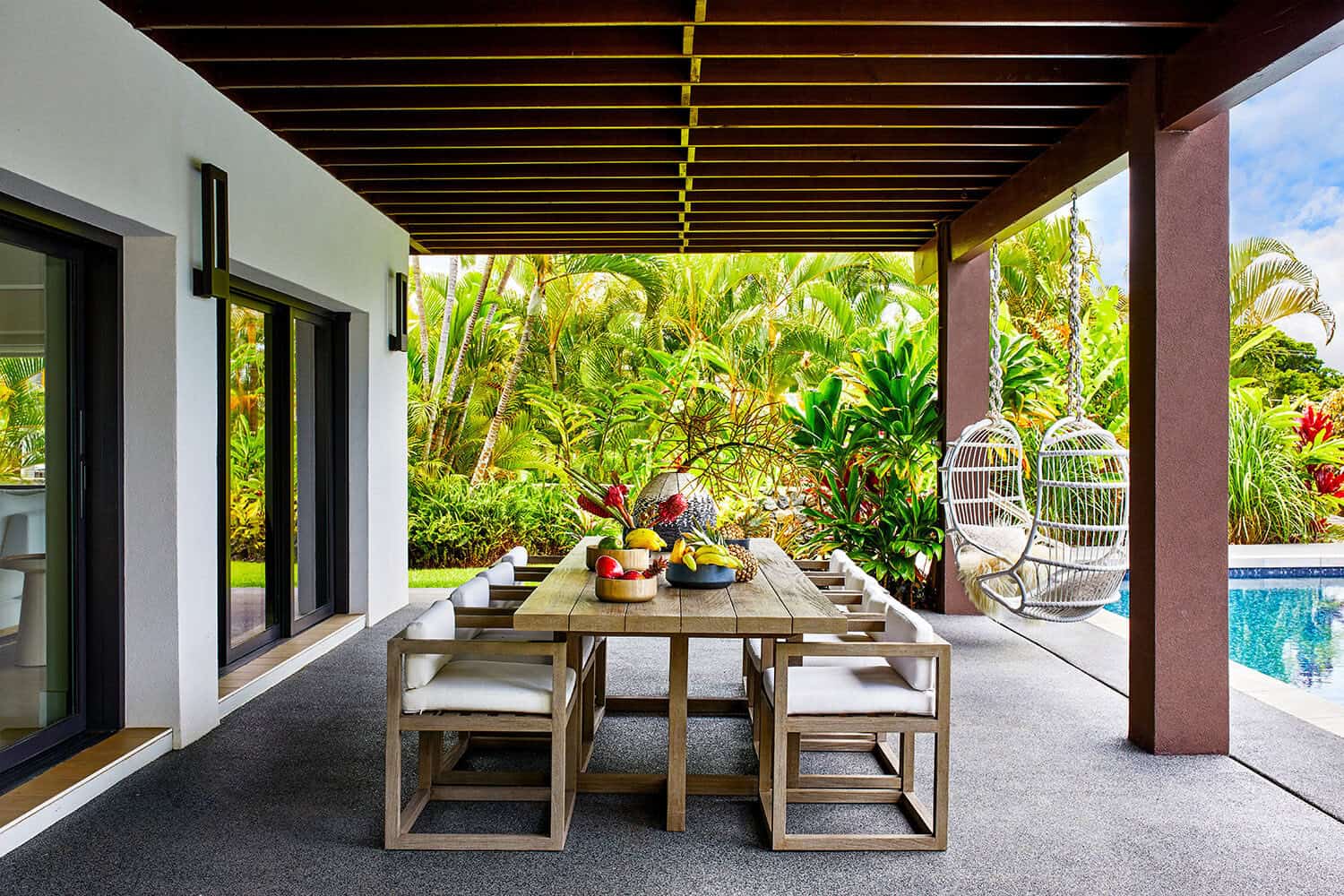 outdoor dining table under a covered patio