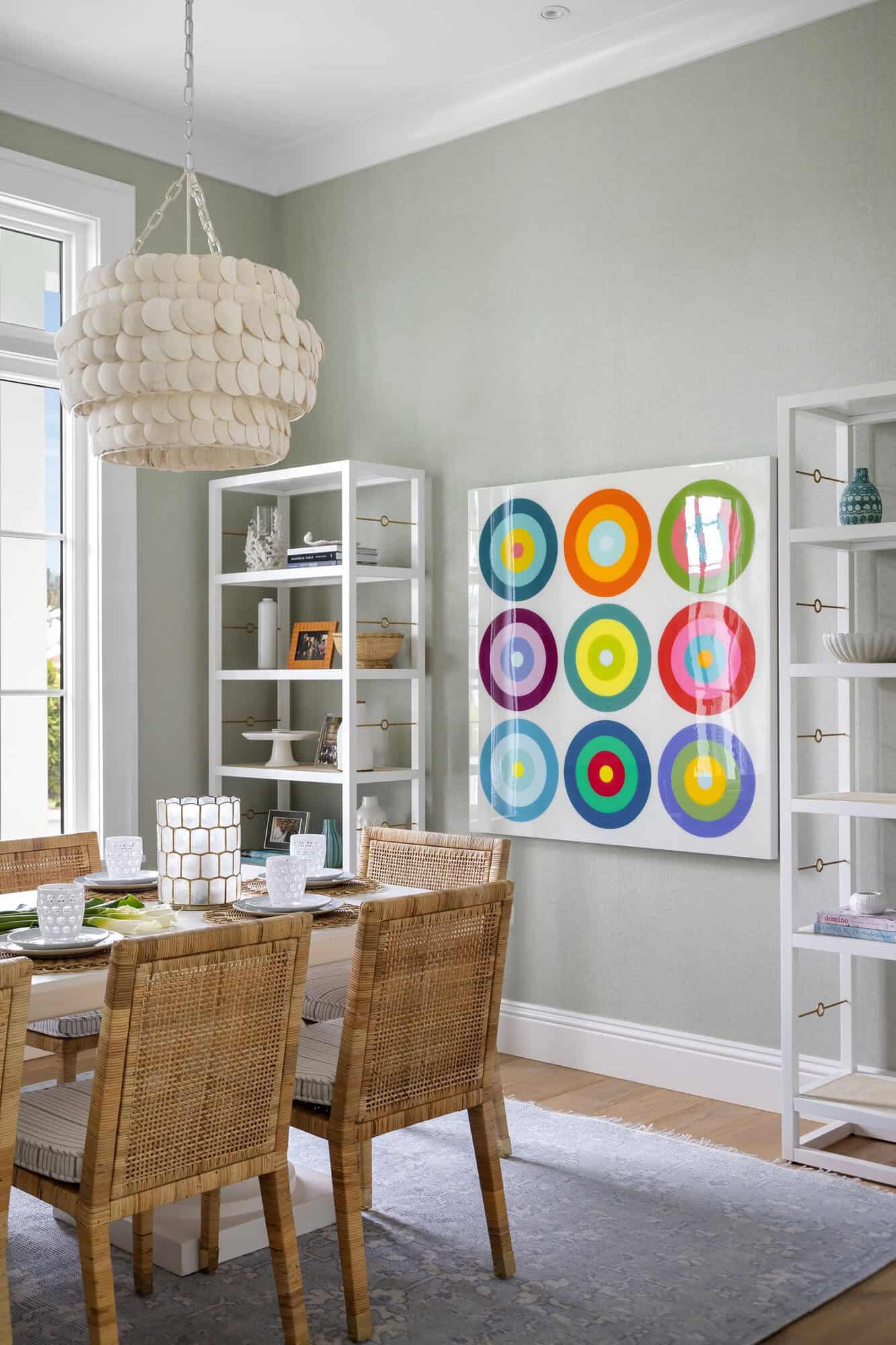 contemporary coastal dining room with artwork