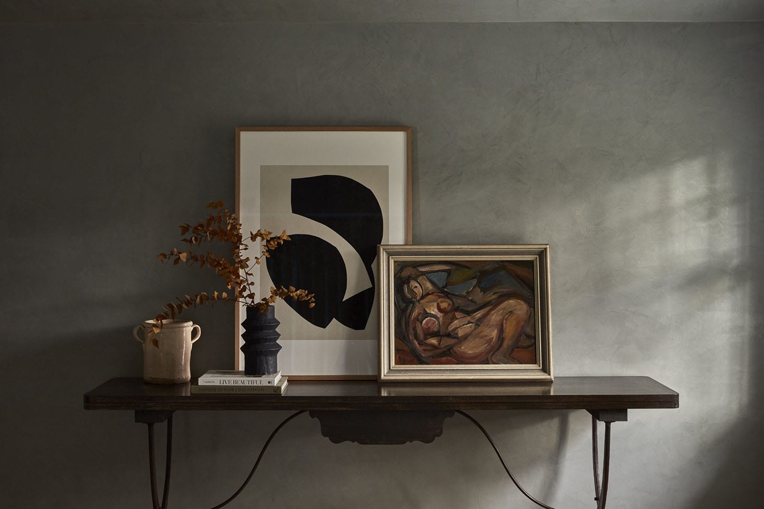 contemporary bedroom with a shelf and artwork