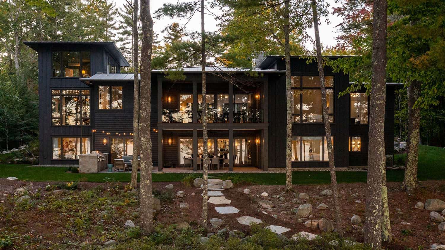 contemporary prairie style home exterior with a stone pathway