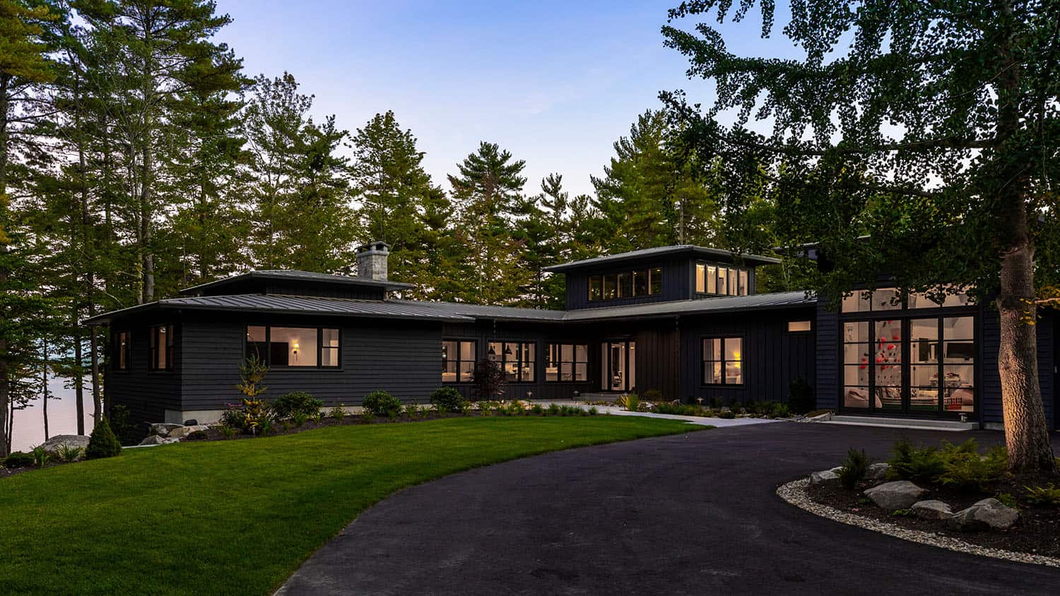 contemporary prairie style home exterior with a front driveway