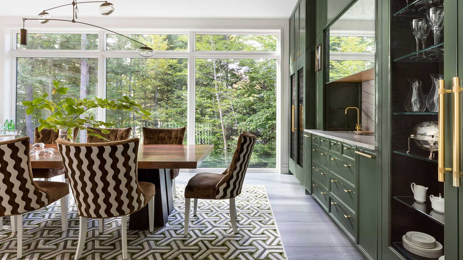 contemporary dining room with a forest room