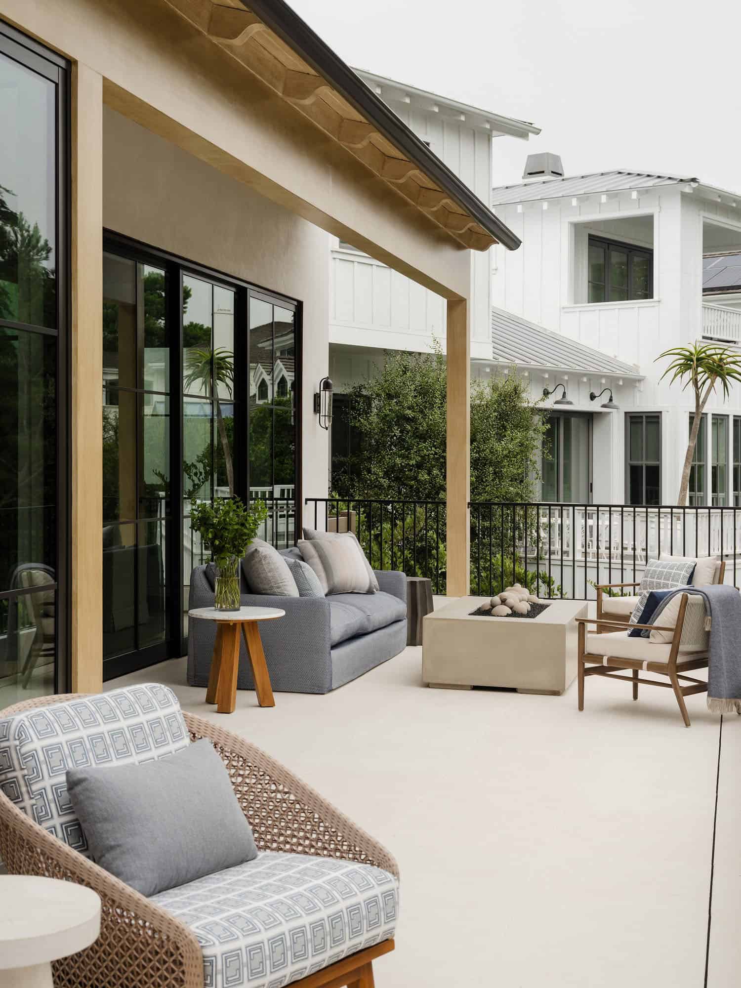 contemporary spanish-style home exterior patio with outdoor furniture
