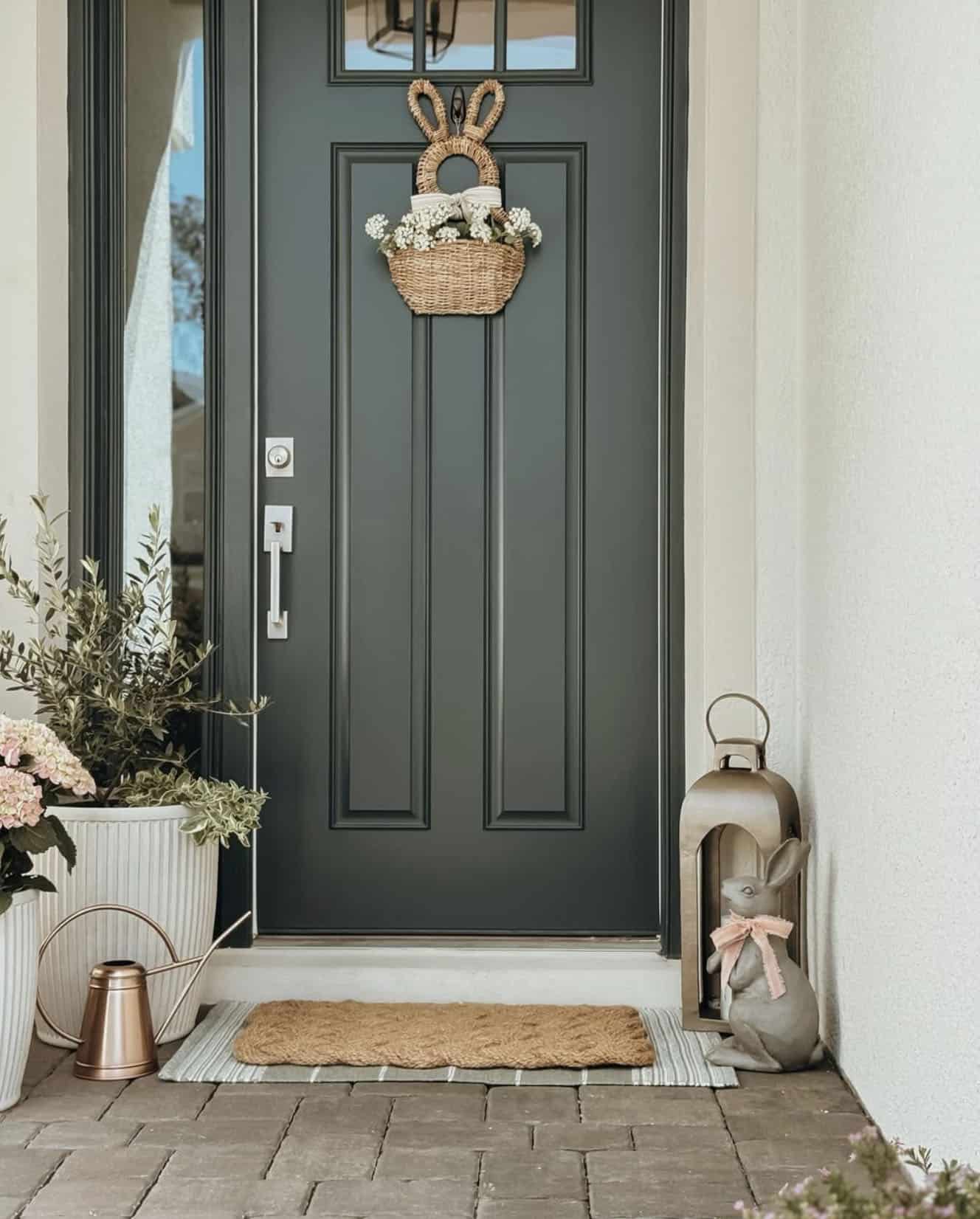 front porch with a wicker bunny basket on the door