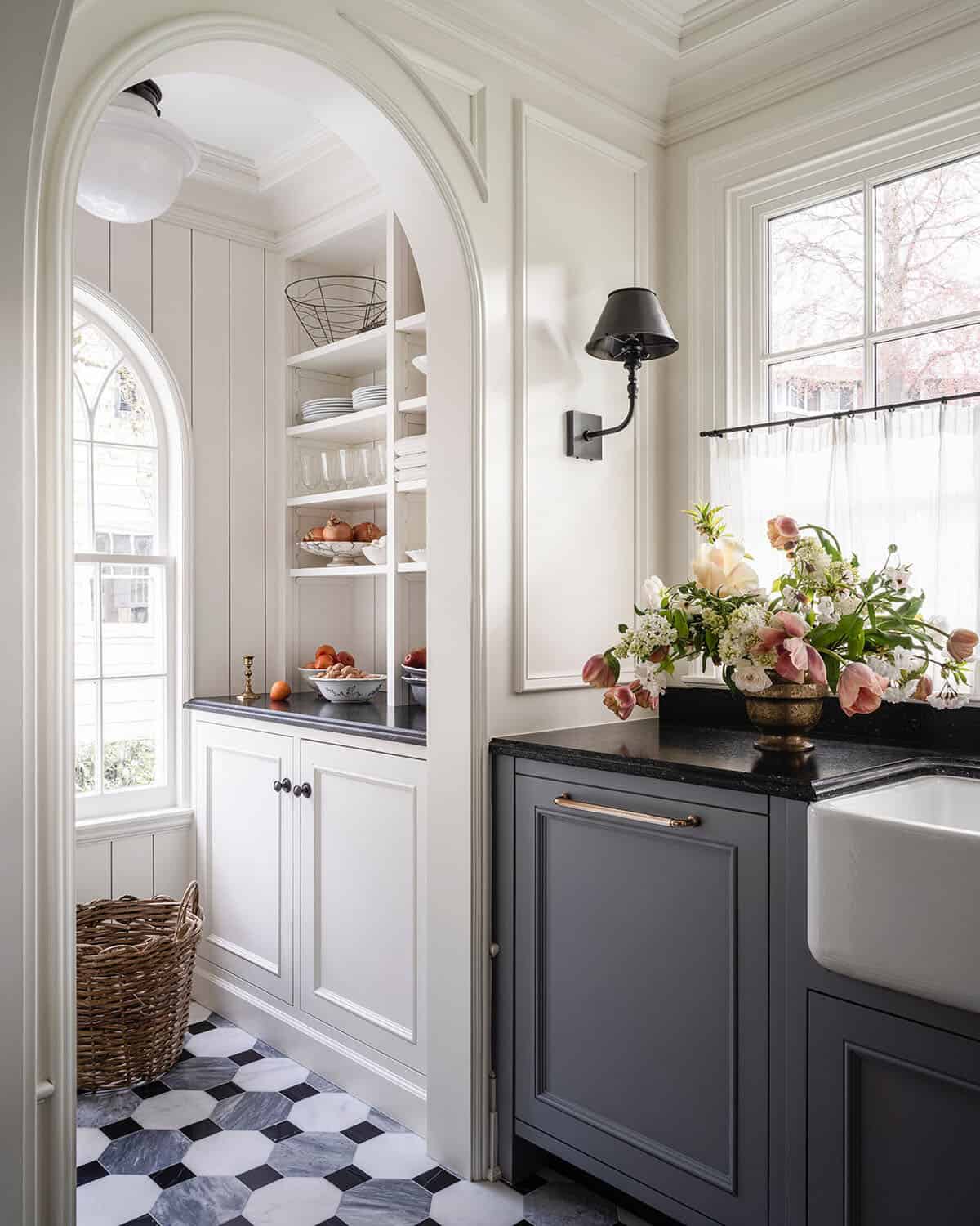 traditional style pantry with a farmhouse sink