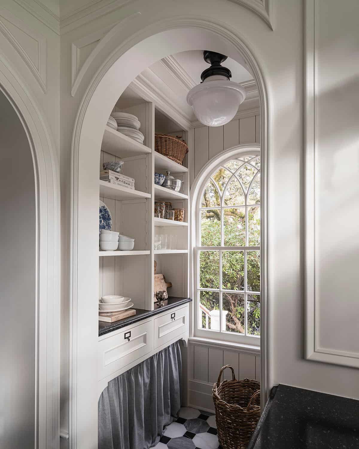 traditional style pantry with a window