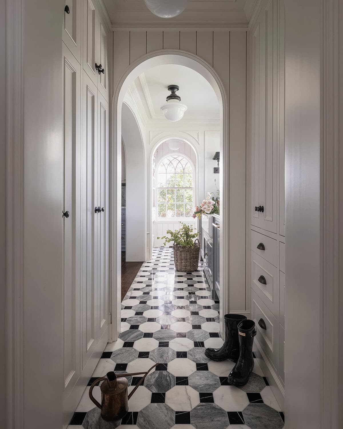traditional style arched hallway