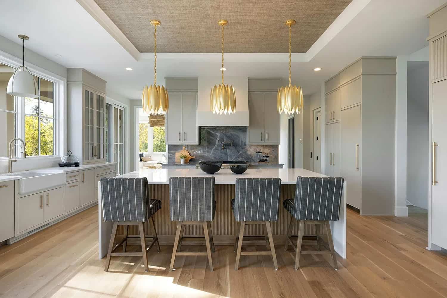 contemporary kitchen with large pendant lights