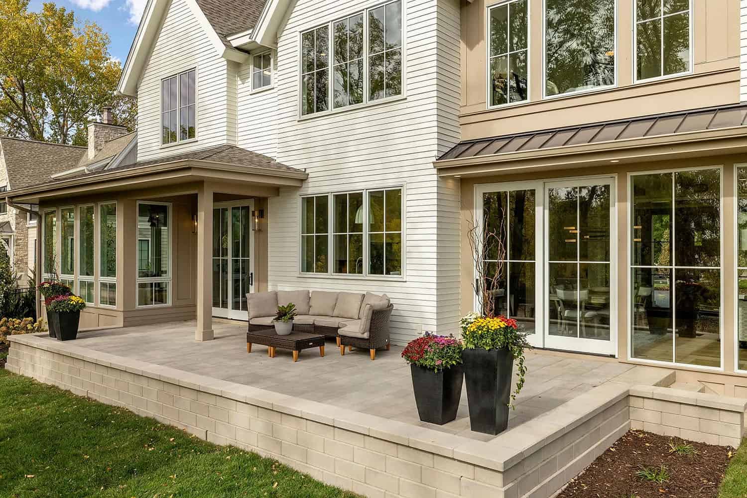 contemporary home exterior with a patio